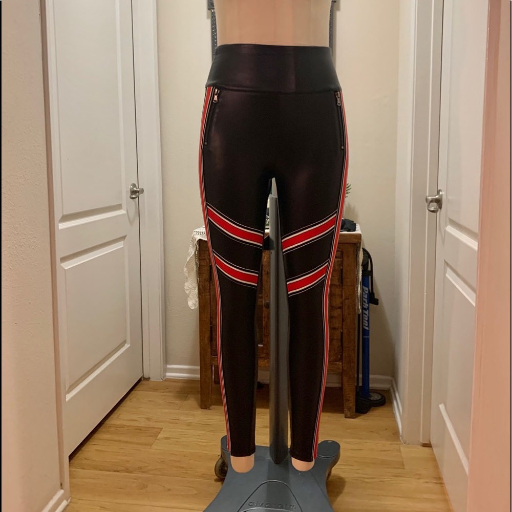 BEBE stretch vegan leather leggings.